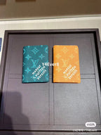 Louis Vuitton small wallets display set, dark green and orange monogram styles