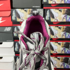 Grey lace-up sneakers with purple padded lining, close-up of collar opening