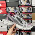 Grey and purple lace-up sneakers, front three-quarter view
