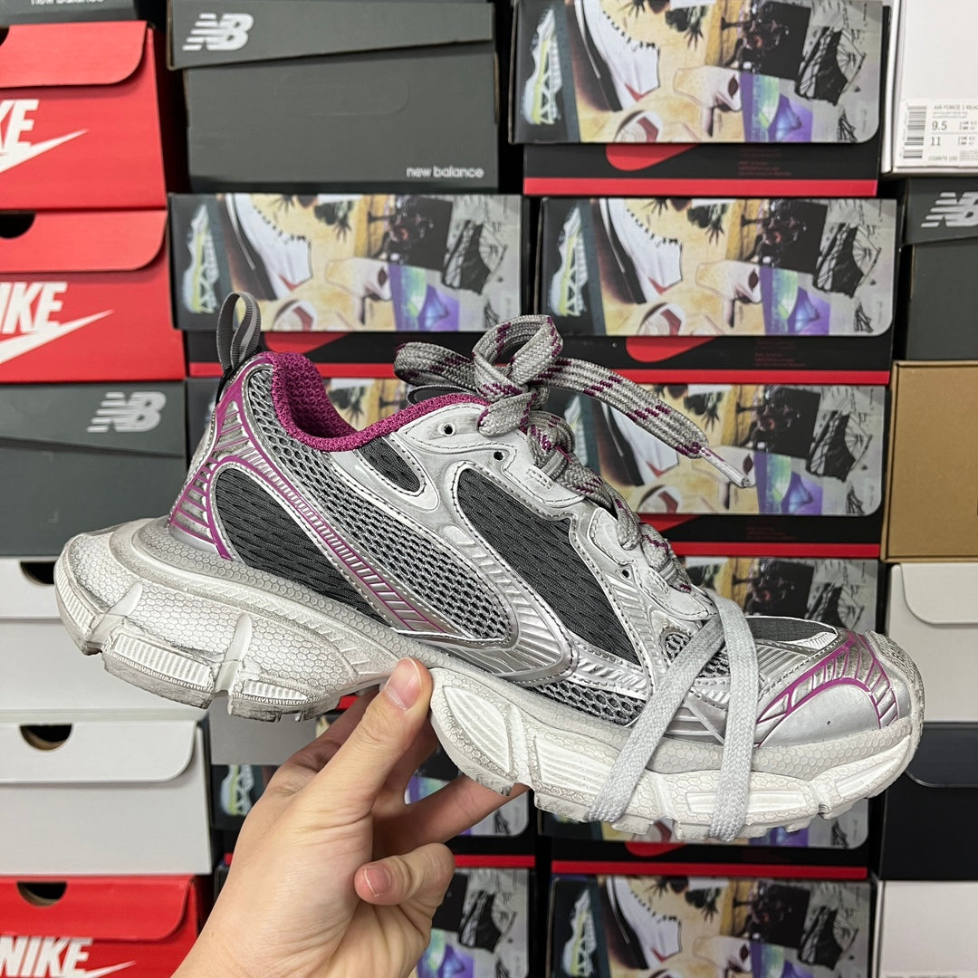 Grey and purple lace-up sneakers, front three-quarter view