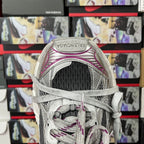 Grey mesh sneakers with purple collar and laces, tongue and upper heel opening view