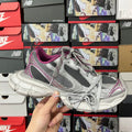 Grey and purple mesh sneakers with lace-up front, padded collar and cushioned sole