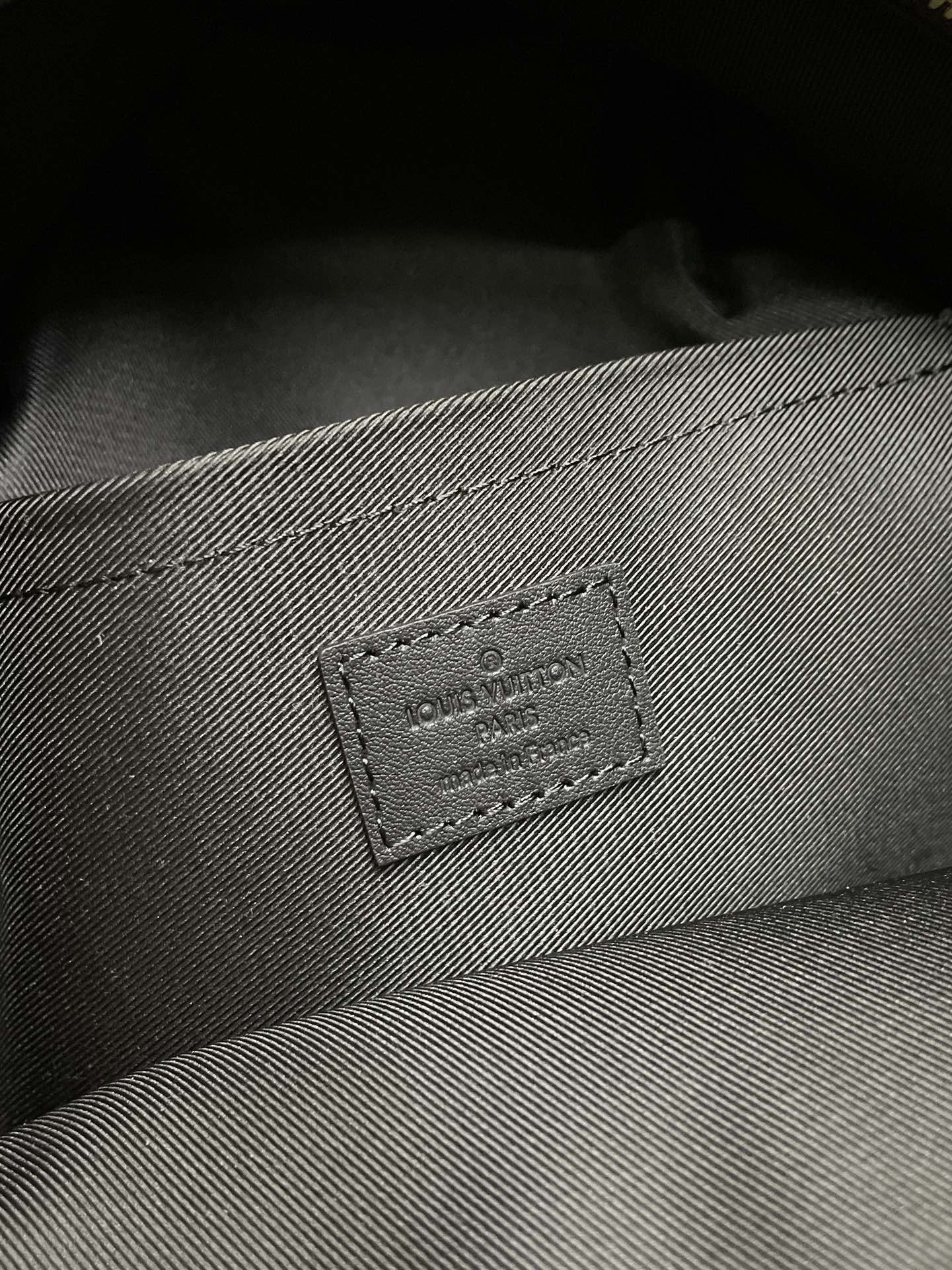 Louis Vuitton fabric interior label patch with stitched border