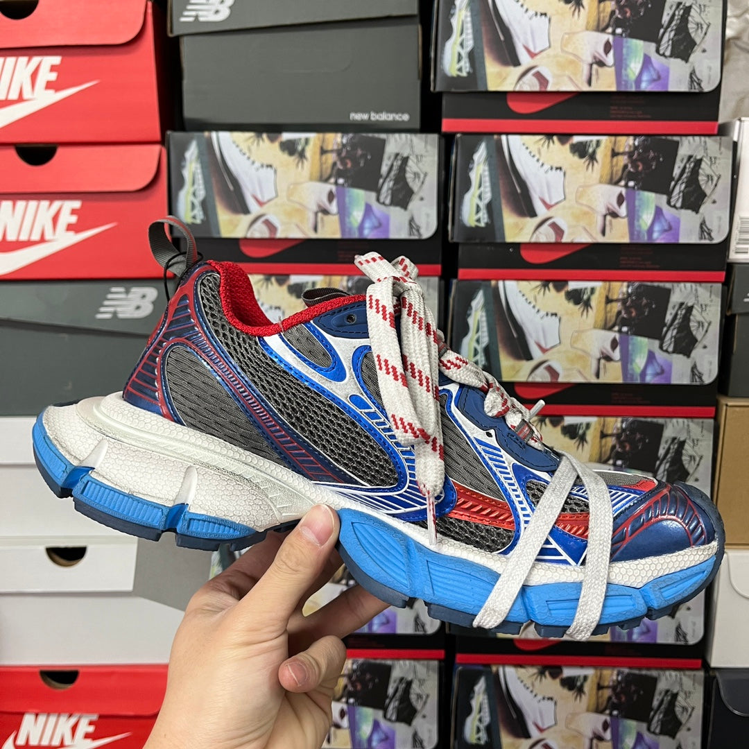Balenciaga unisex running sneakers, blue navy and red with white laces, side angle