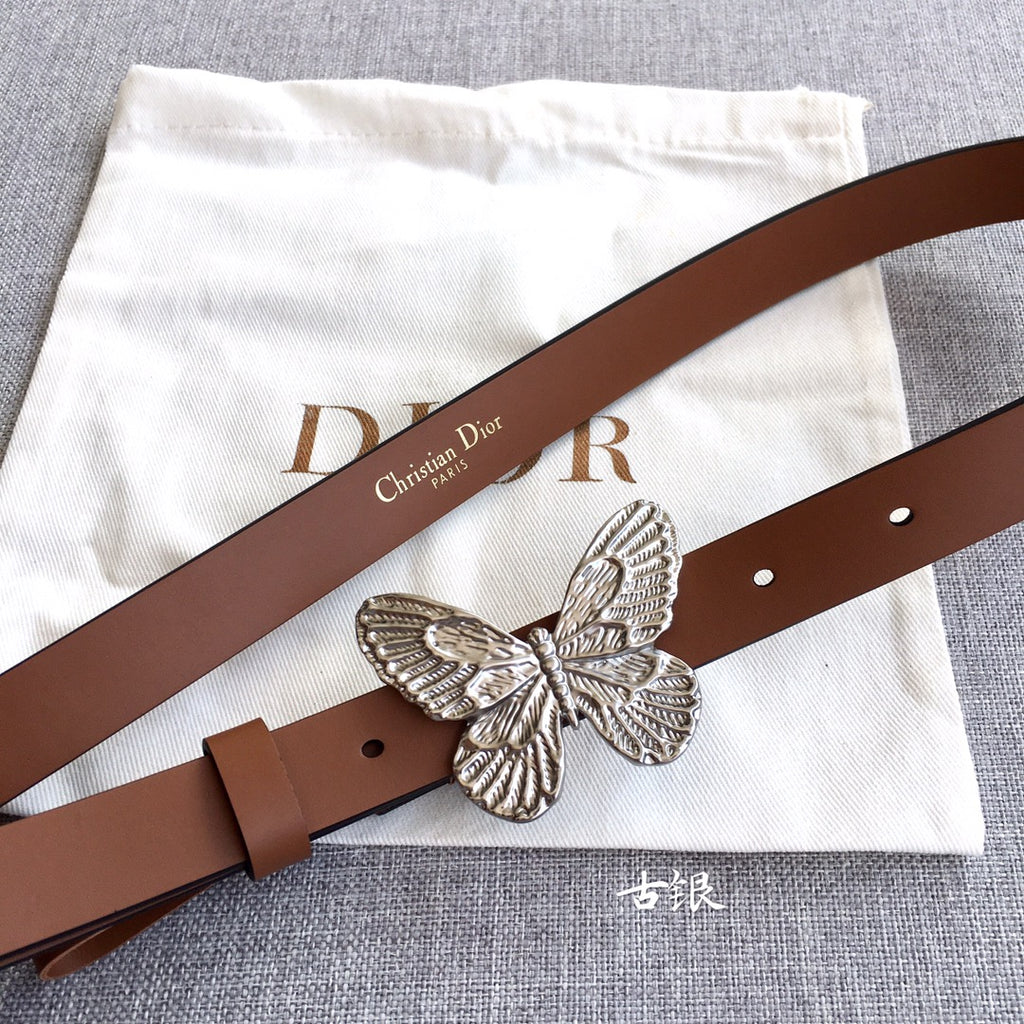 Brown leather belt with silver butterfly buckle and multiple strap holes