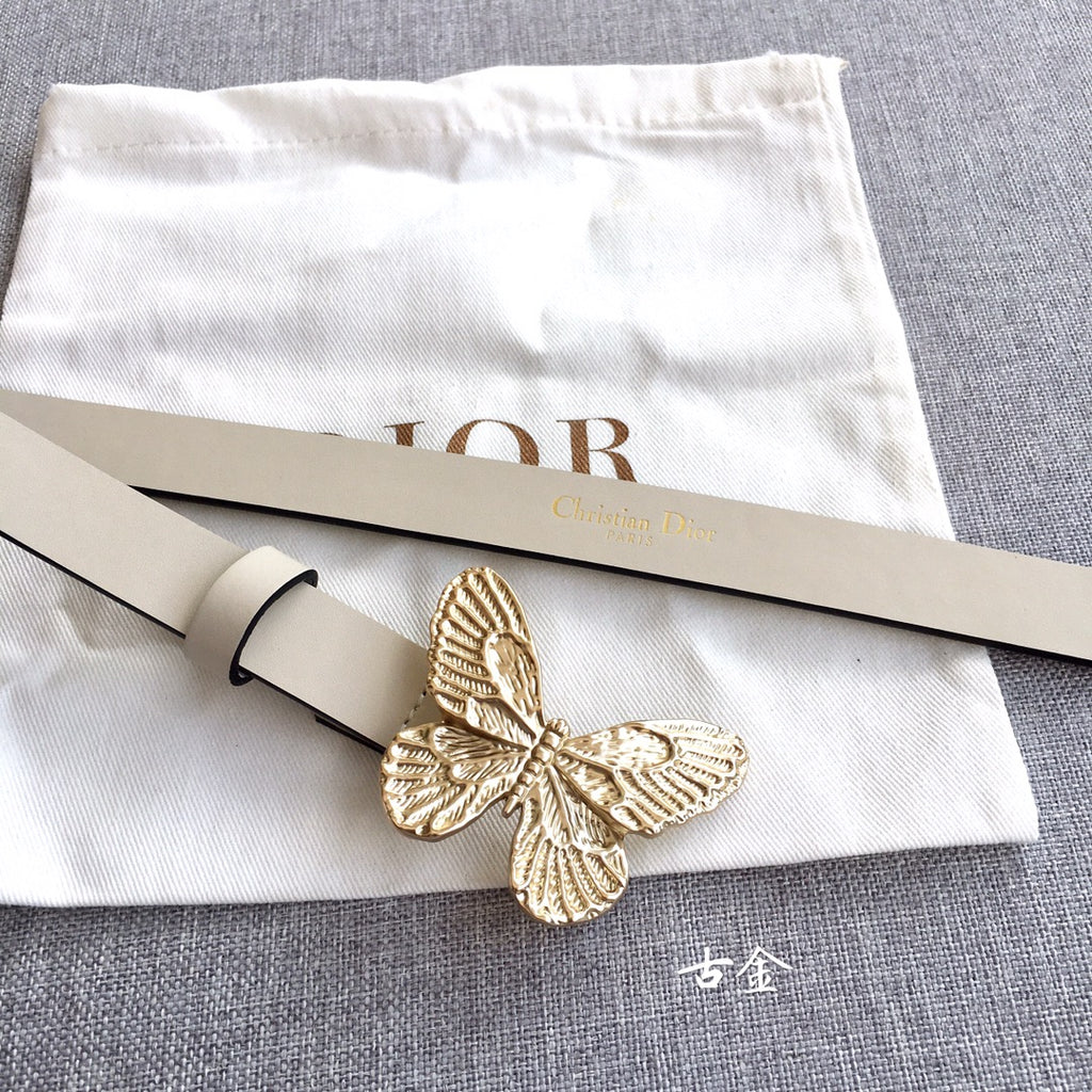 Light beige belt with gold butterfly buckle and pin closure, shown with dust pouch
