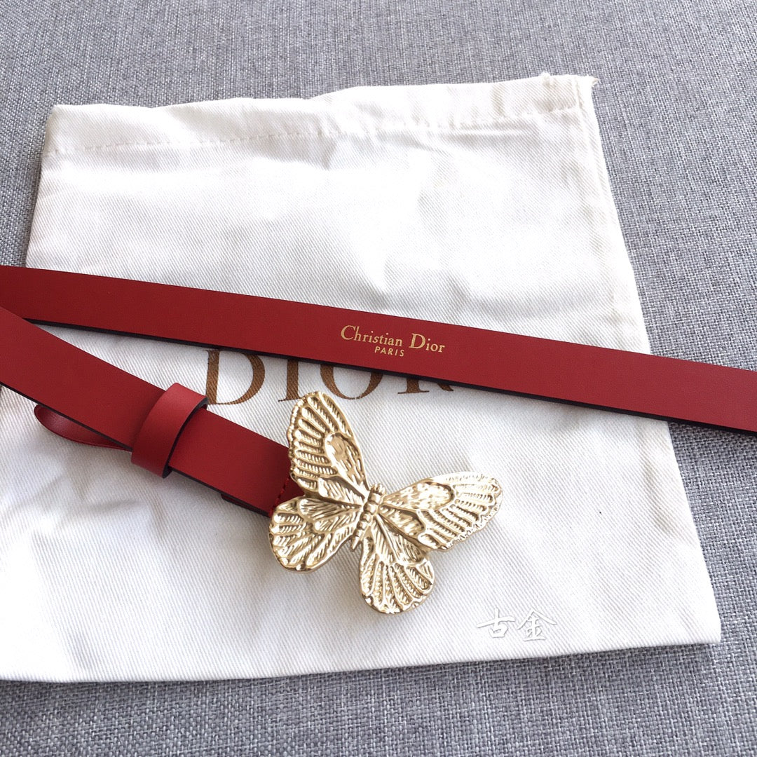 Red leather belt with gold-tone butterfly buckle and a red buckle keeper strap.