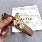 Dior belt in brown with gold butterfly buckle; leather strap with multiple holes