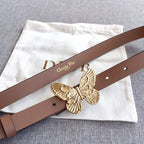 Dior belt with brown leather strap and ornate gold butterfly buckle centerpiece