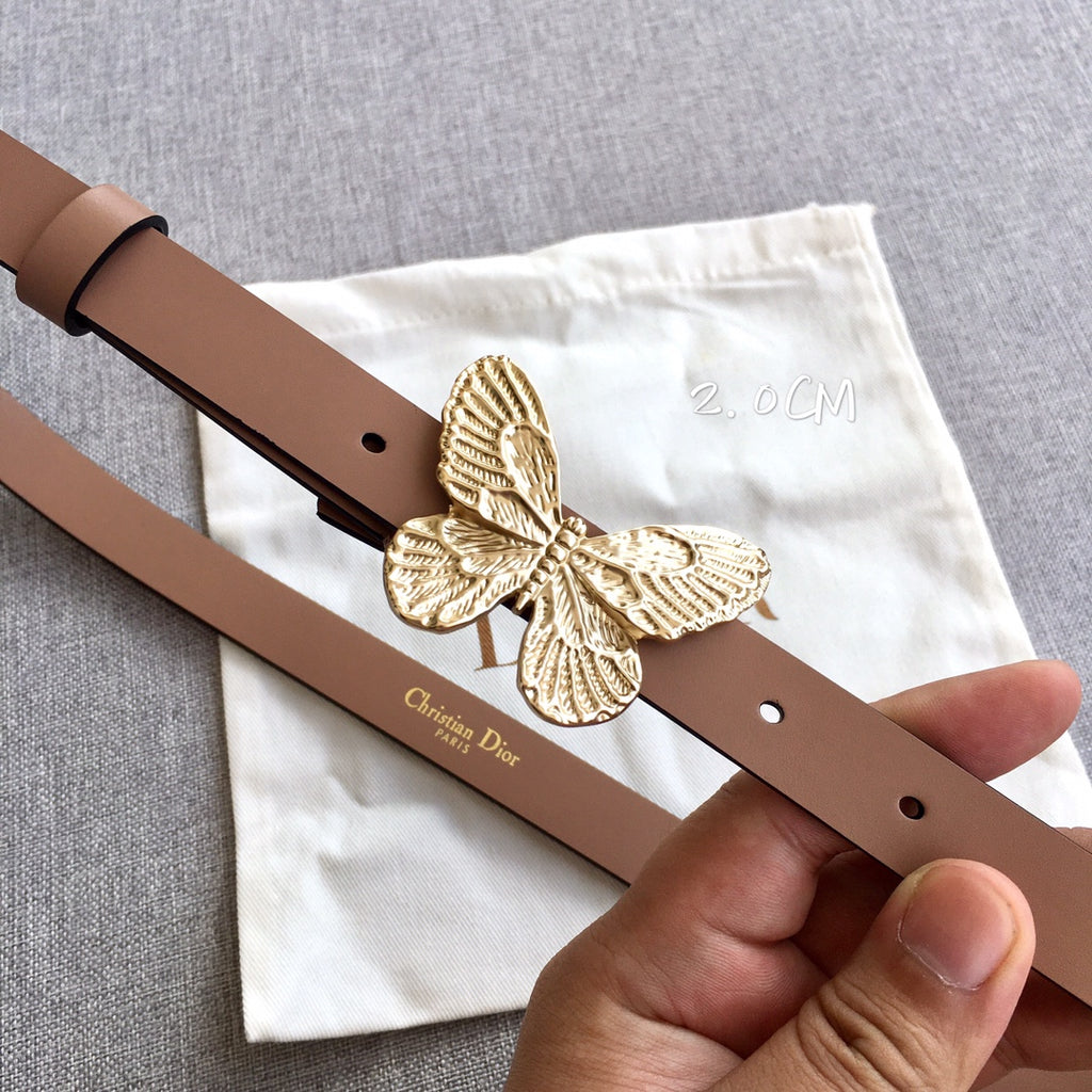 Dior belt close-up: brown strap with gold butterfly buckle and single metal hole