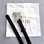Dior black leather belt with butterfly-shaped silver-tone buckle on strap