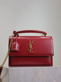 YSL bag with flap, red leather, gold chain strap and YSL logo front.