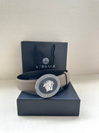 Leather belt with light taupe strap and silver-tone Greca Medusa buckle on box