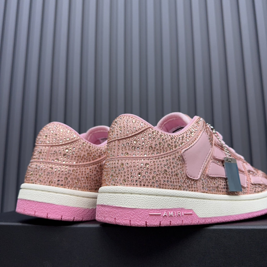 Amiri pink sequin sneakers showing heel and back, with AMIRI logo on the sole