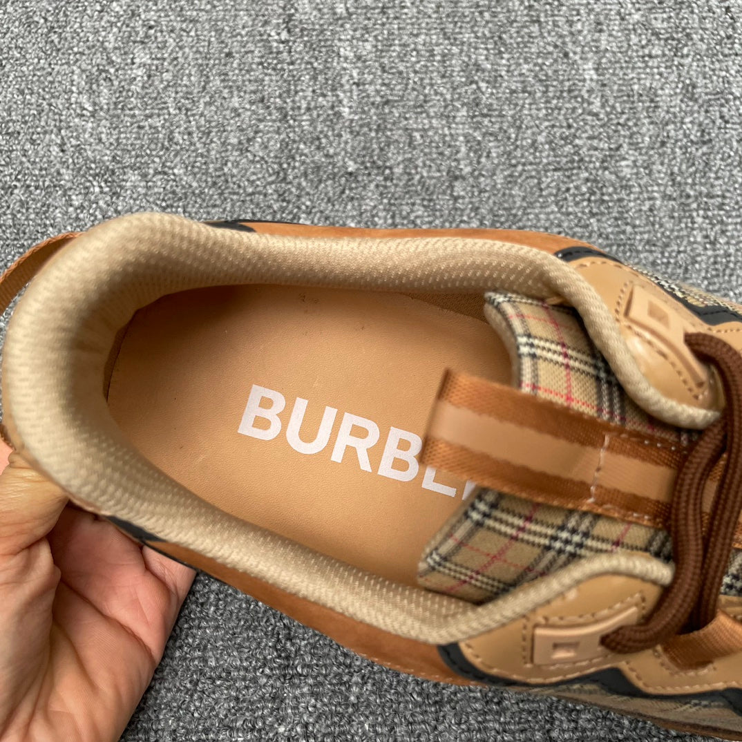 Burberry sneaker interior with 'BURB' logo on beige lining
