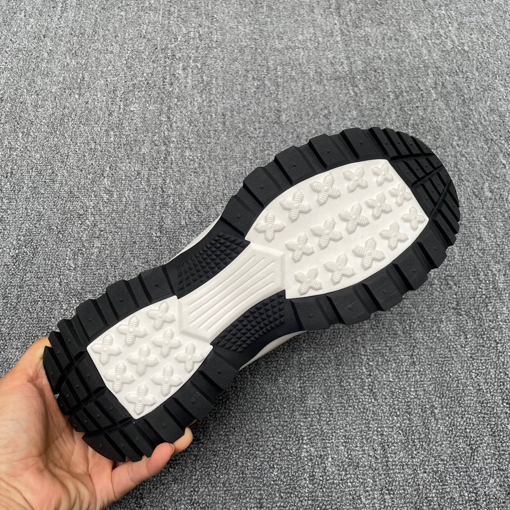 Burberry sneaker outsole tread, black rubber with white patterned traction