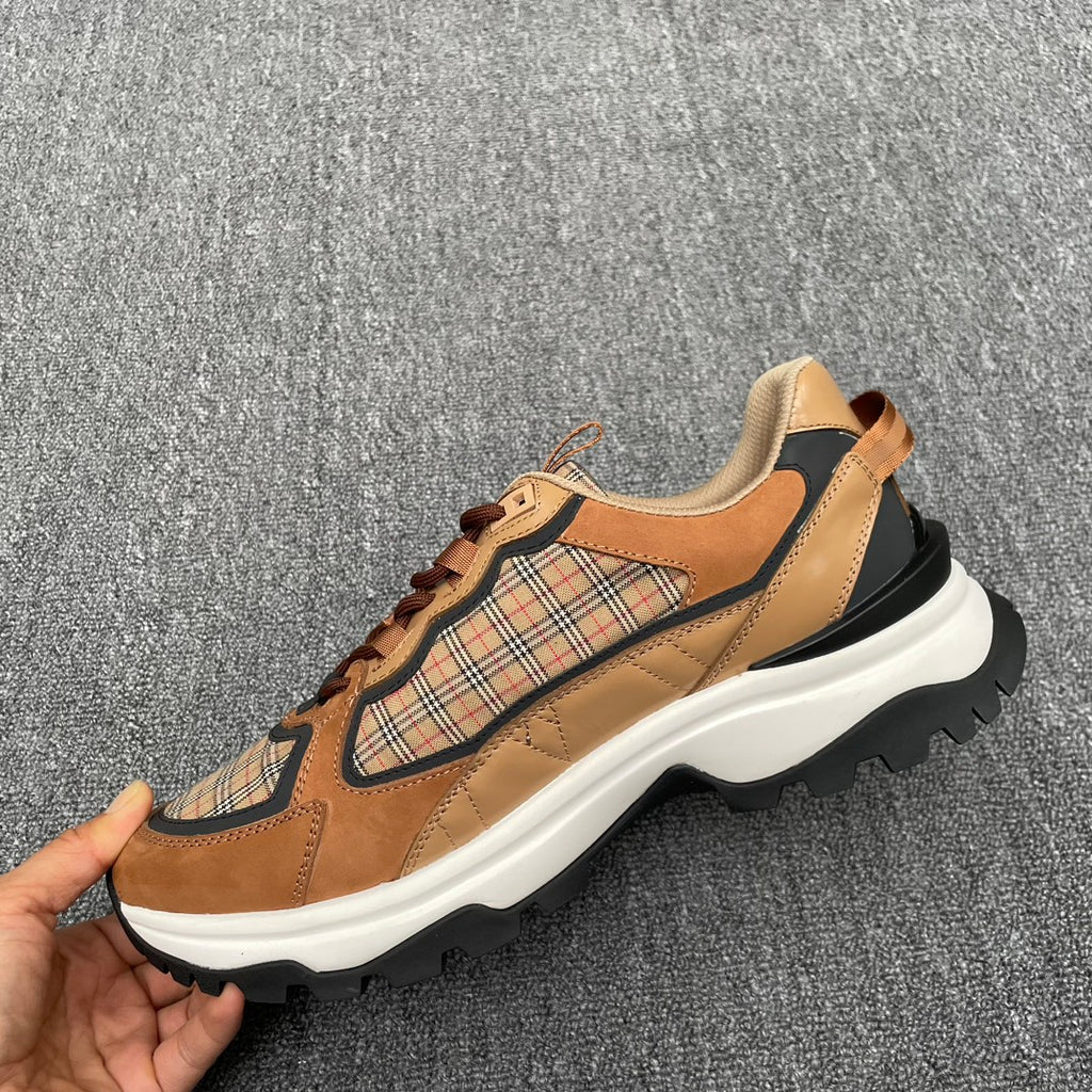 Burberry sneaker with plaid side panel, tan leather and brown lace-up, white sole
