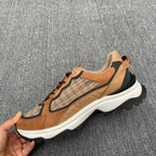 Burberry sneaker with plaid side panel, tan leather and brown lace-up, white sole