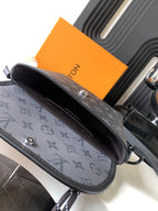Louis Vuitton bag side view with gray monogram canvas, stitched trim, and strap