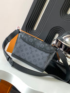 Louis Vuitton monogram crossbody bag with single strap and top zipper, silver hardware