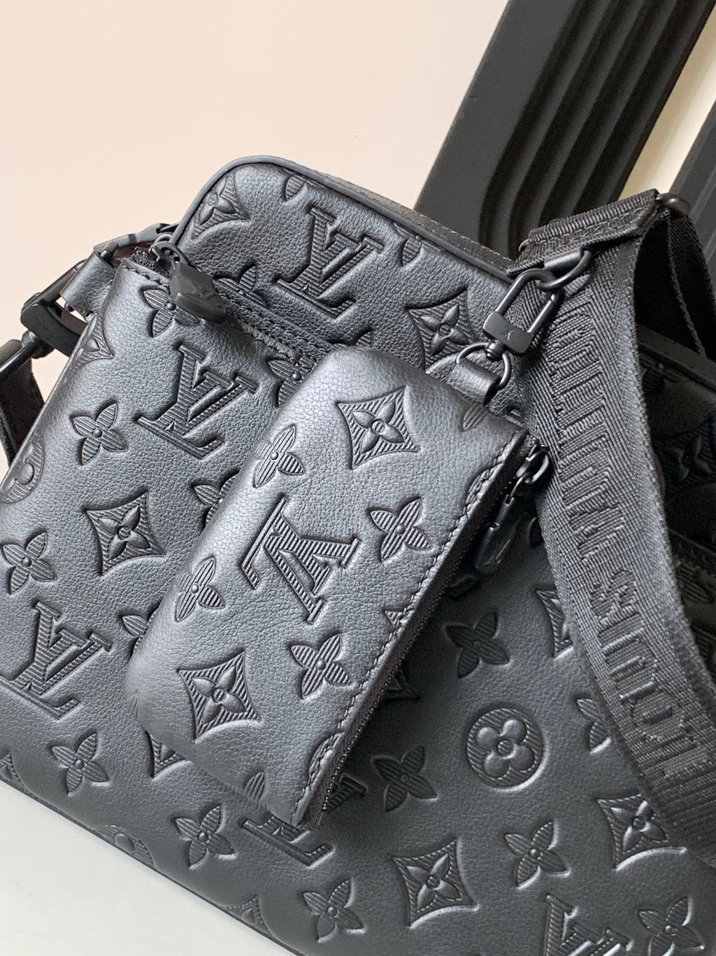 Louis Vuitton crossbody bag, dark gray monogram print with buckle strap detail