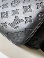 Louis Vuitton embossed leather bag, dark gray monogram texture and stitched trim