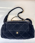 Chanel quilted shoulder bag in dark navy with top handle and gold chain strap