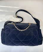 Chanel quilted shoulder bag in dark navy with gold chain handle and flap
