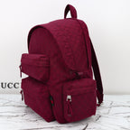 Gucci burgundy GG-pattern backpack with front utility pockets and top handle