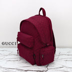 Gucci burgundy GG-pattern backpack with flap front pocket and side zippers