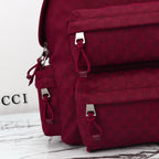 Gucci burgundy backpack front with zip pull, buckle hardware, and side straps