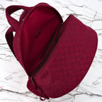 Gucci burgundy duffel bag with open top and interior lining, monogram fabric and zipper