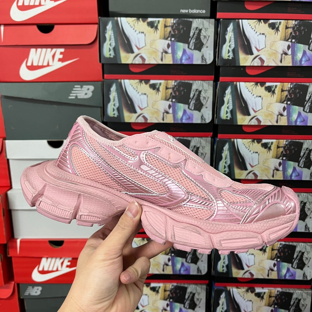 Pink Balenciaga unisex sneaker side view with chunky sole and mesh upper