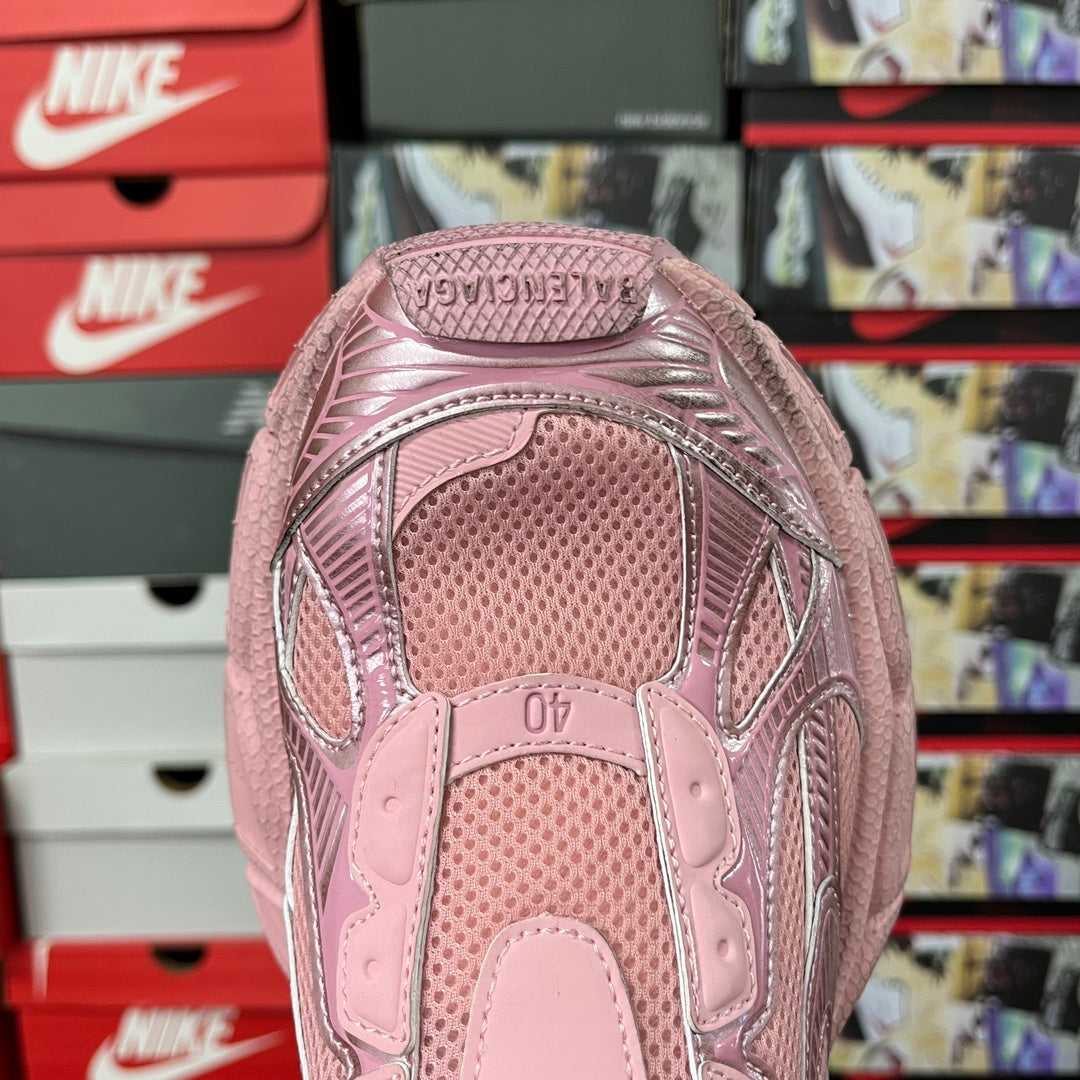 Pink Balenciaga unisex sneaker toe and mesh panels with lace-up overlay