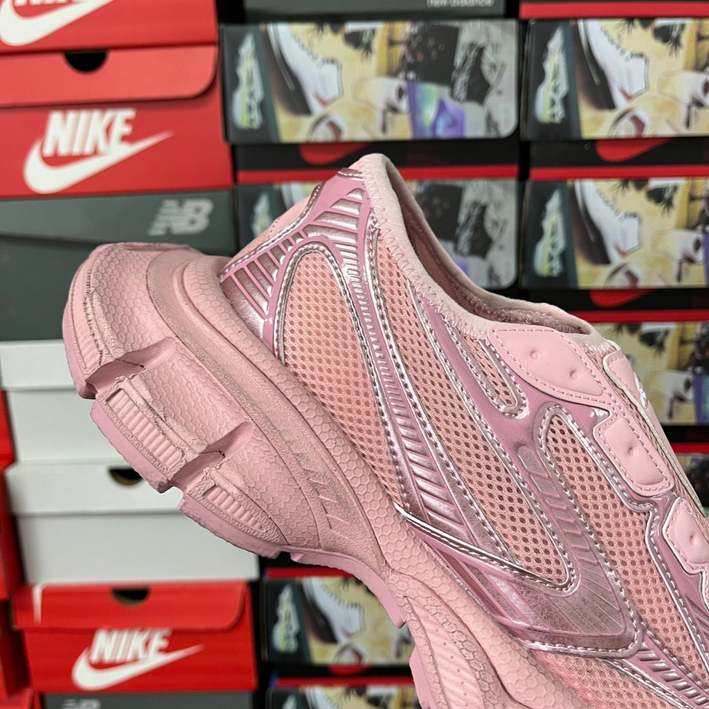 Pink Balenciaga unisex sneaker side profile with quilted texture and lace overlays