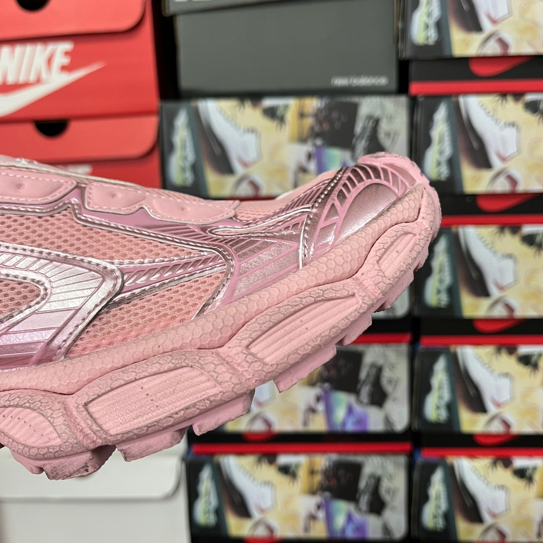 Pink Balenciaga unisex sneaker side view with chunky sole and vented toe area