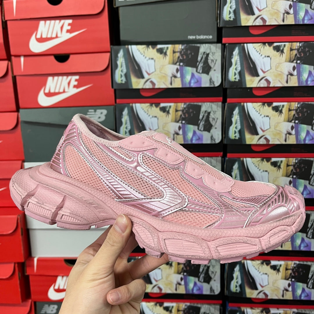 Pink Balenciaga unisex sneaker with textured side panels and lace-up detailing