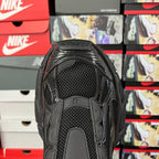 Balenciaga unisex sneakers back view, black mesh panels and stitched strap detail