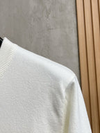 Gucci white knit sweater shoulder with ribbed collar and cuff detail