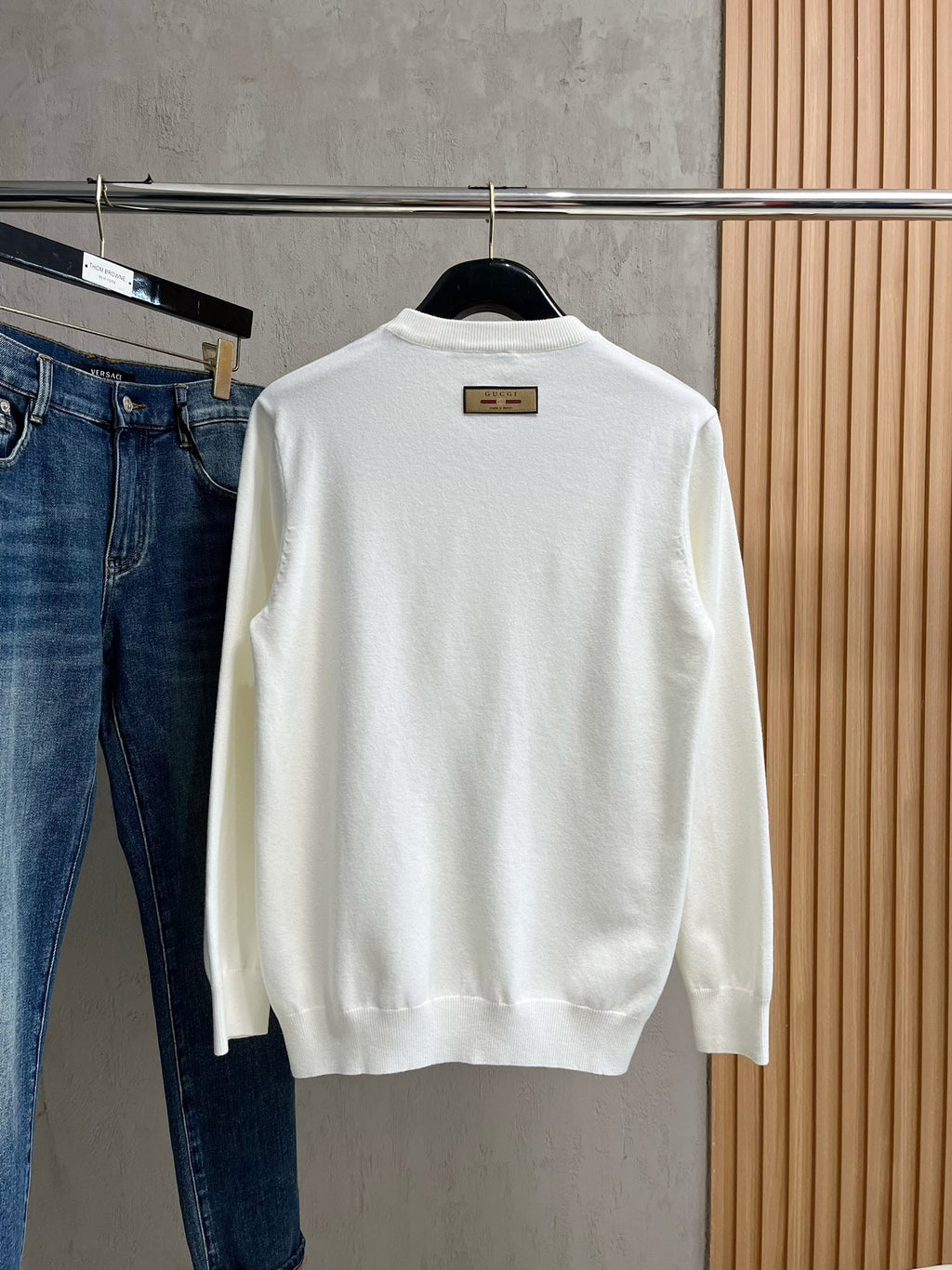 Gucci white crewneck sweater back view with small brown label