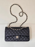 Chanel dark navy quilted flap shoulder bag with chain strap and CC logo