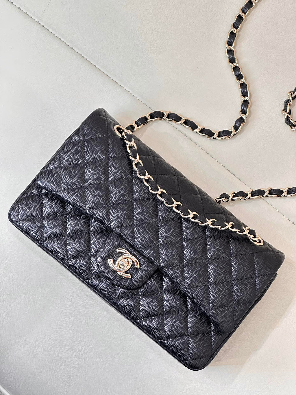 Chanel dark navy quilted shoulder bag with chain link strap and CC logo