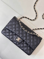 Chanel dark navy quilted shoulder bag with chain link strap and CC logo