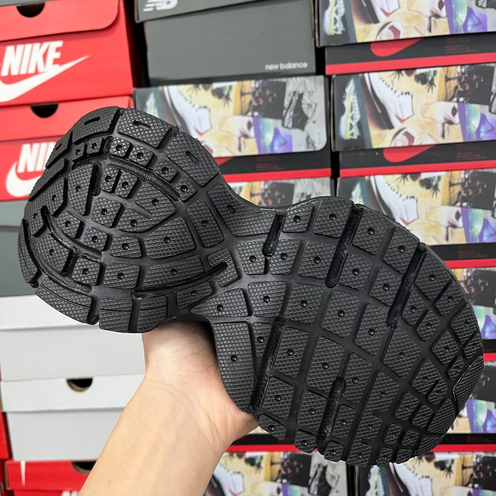 Black rubber outsole for sneaker with textured traction tread pattern