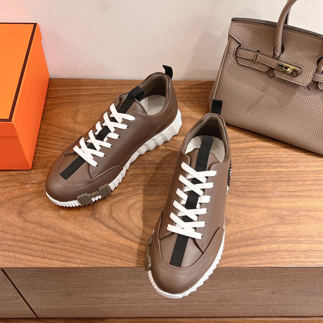 Hermes unisex sneakers, brown leather, white laces, black side stripe detail, chunky sole