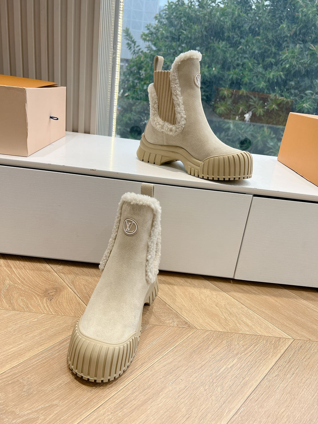 Louis Vuitton suede ankle boot, beige shearling cuff and chunky ridged outsole
