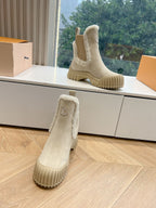 Louis Vuitton suede ankle boot, beige shearling cuff and chunky ridged outsole