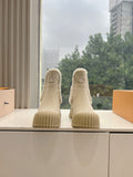Louis Vuitton suede ankle boots, beige with shearling trim and ridged rubber sole