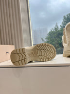 Louis Vuitton ankle boot outsole, beige rubber tread with LV monogram