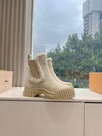 Louis Vuitton suede ankle boots, beige with shearling lining and chunky ridged sole